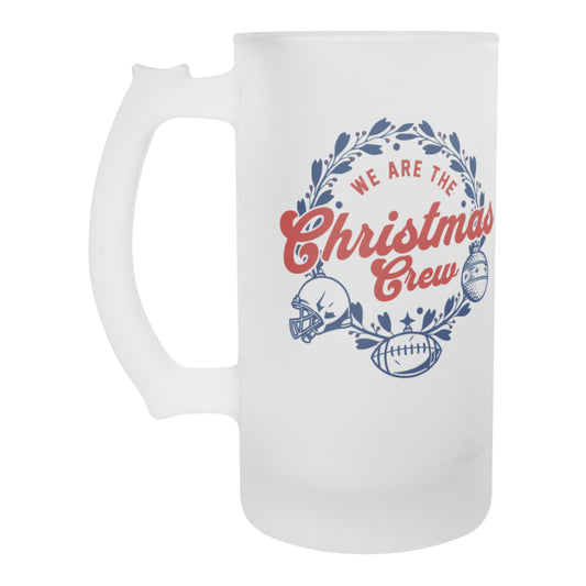 A frosted beer stein with a 'We are the Christmas Crew' text design, featuring football imagery and holiday motifs.