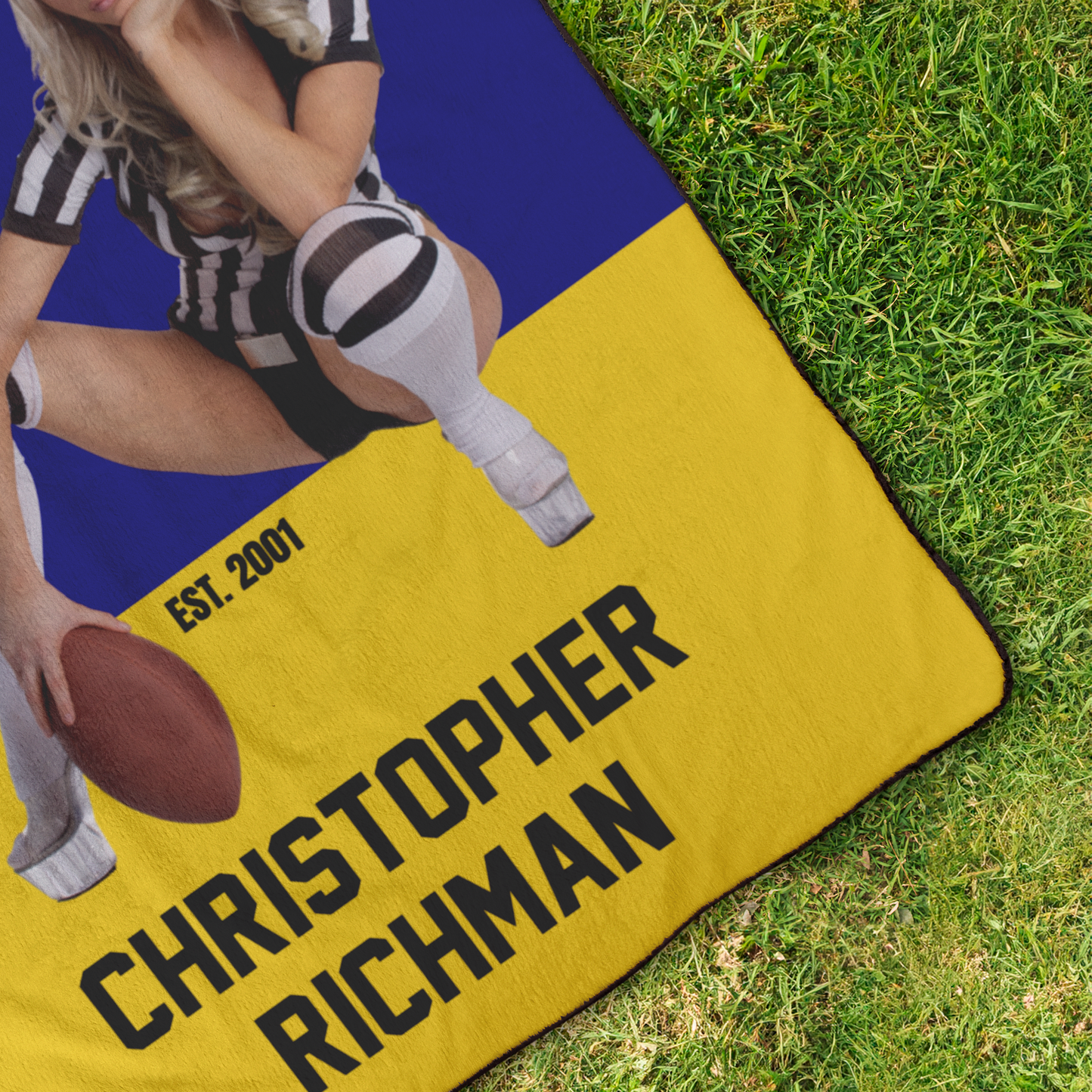 AFFans_Stadium_Blanket_with_Number_N_StadiumBlanket_OverheadGrass_V_Mockup.png