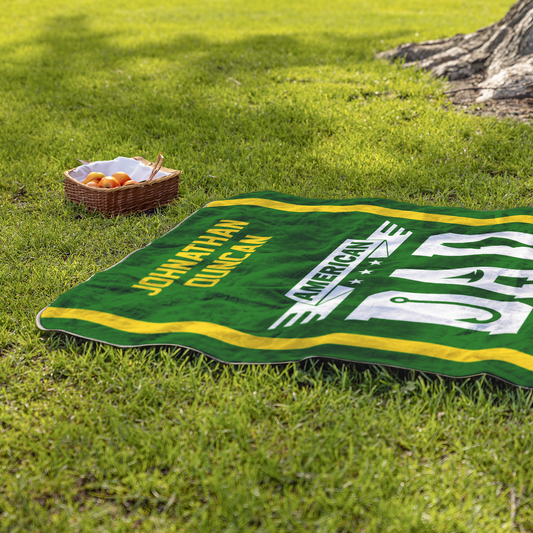 AFFans_Stadium_Blanket_AMERICAN_DAD_w_StadiumBlanket_Lifestyle_Grass_V_AS_Mockup.png