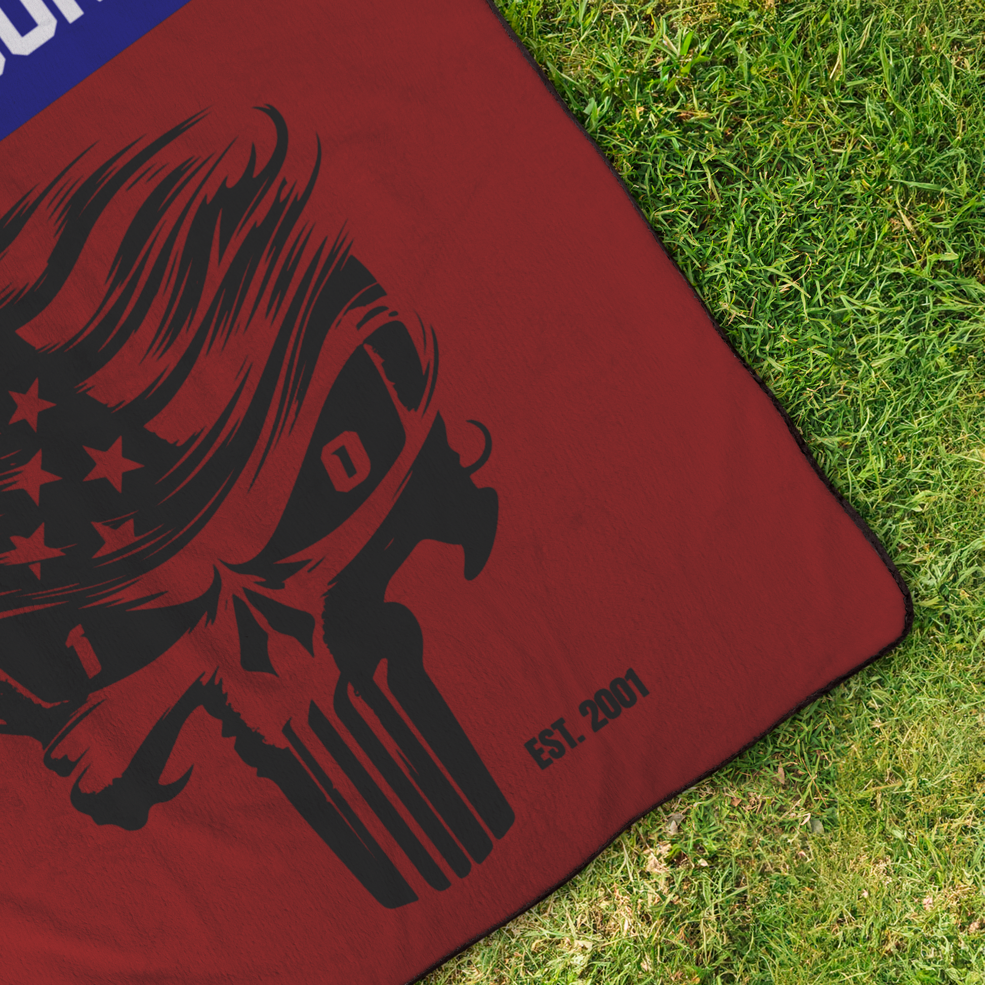 AFFans_Stadium_Blanket_SCULL_with_Nam_StadiumBlanket_OverheadGrass_V_Mockup.png