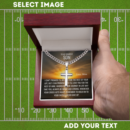 Cross necklace in a box with a personalized message on a football field background