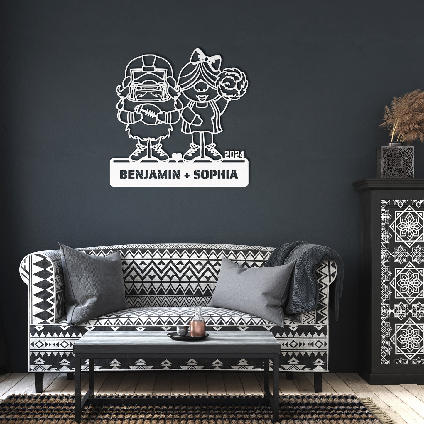 A custom metal sign featuring illustrations of a football player and a cheerleader, with the names Benjamin and Sophia, and the year 2024.